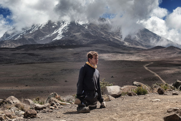Alexander D'Jamoos with Mt. Kilimanjaro in the background.